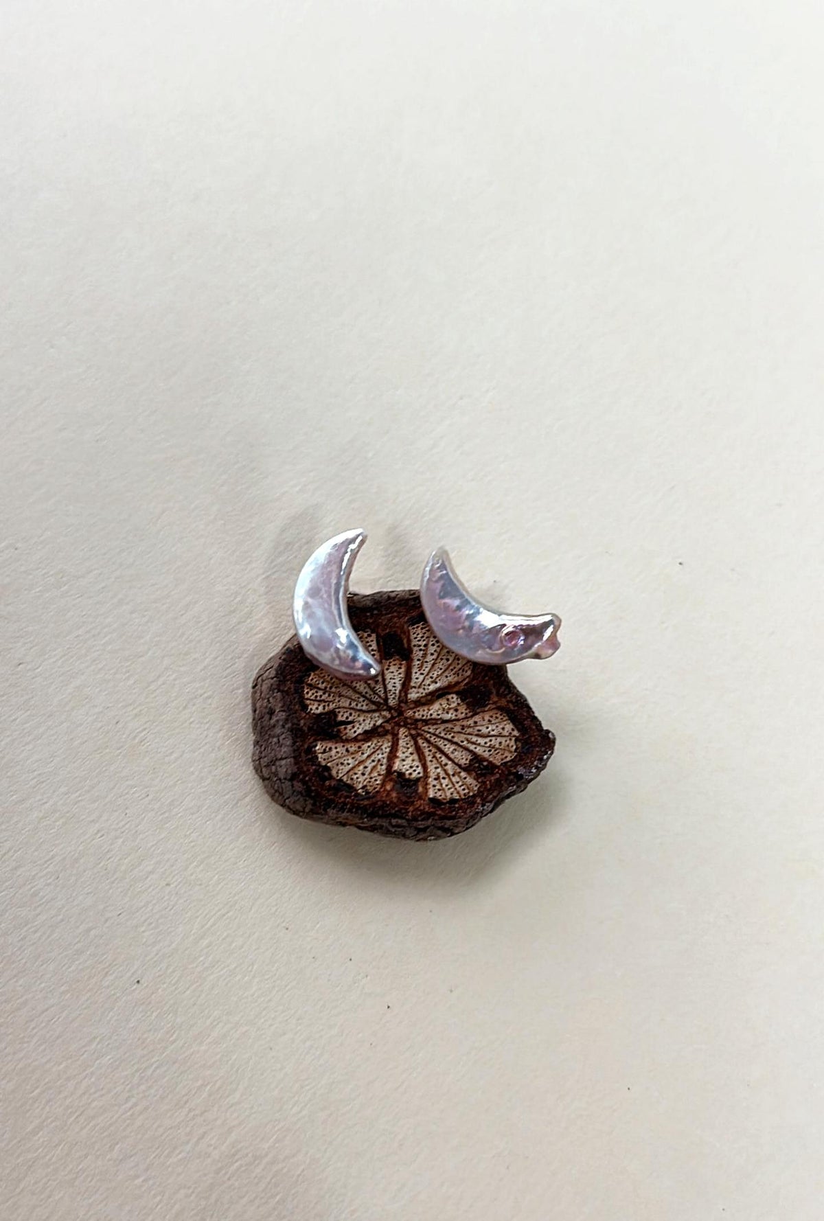 Iridescent crescent moon baroque pearl stud earrings in sterling silver