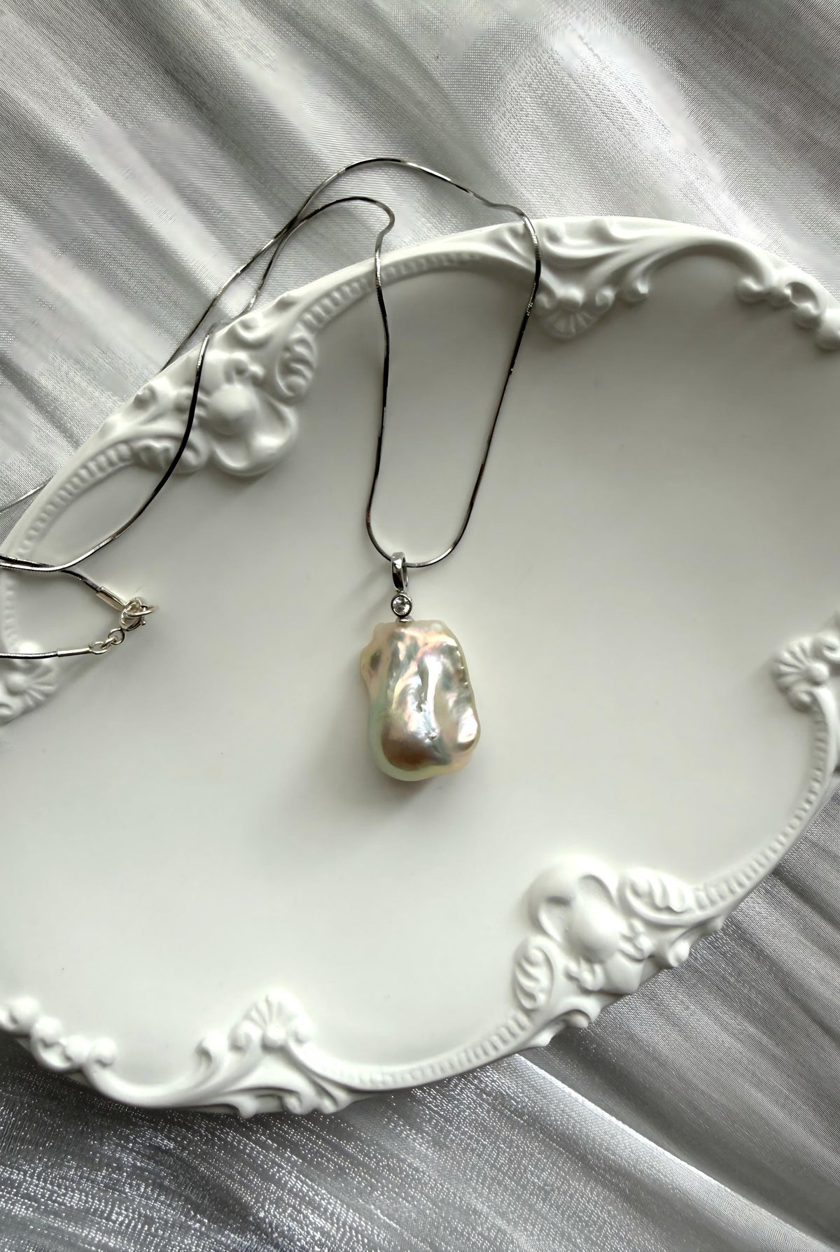 One of a kind greenish-white baroque pearl pendant necklace in sterling silver