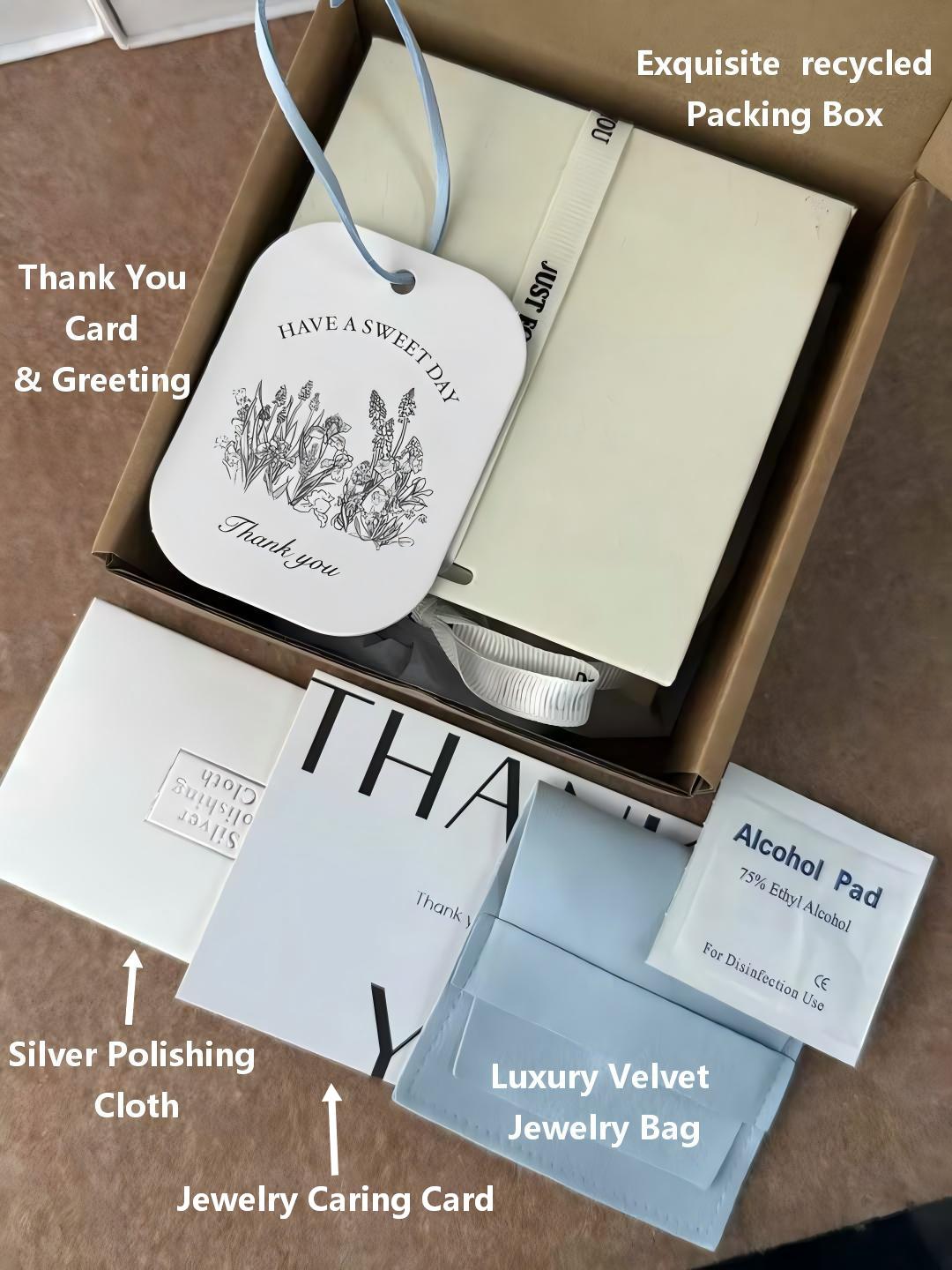 Alivy Jewels gift packaging: recycled box, velvet jewelry bag, silver polishing cloth and thank-you card